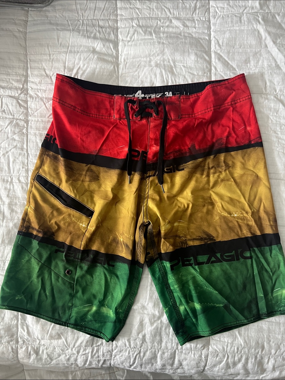 Pelagic Men’s Red, Yellow & Green Colorblock Board Shorts Tony Ludovico